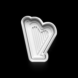 Harp-shaped cookie cutter from the Musik Keks-Ausstecher set, perfect for music-themed baking.