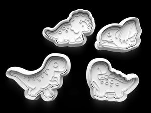 Dinosaur cookie cutters set featuring T-Rex, Stegosaurus, and more on a black background, perfect for dino-themed parties.