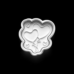 Heart-shaped balloon cookie cutter for Valentine's Day baking.