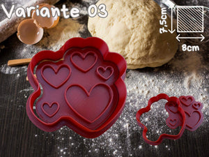 Red heart-shaped cookie cutters set on a baking surface, perfect for Valentine's Day and romantic cookies.