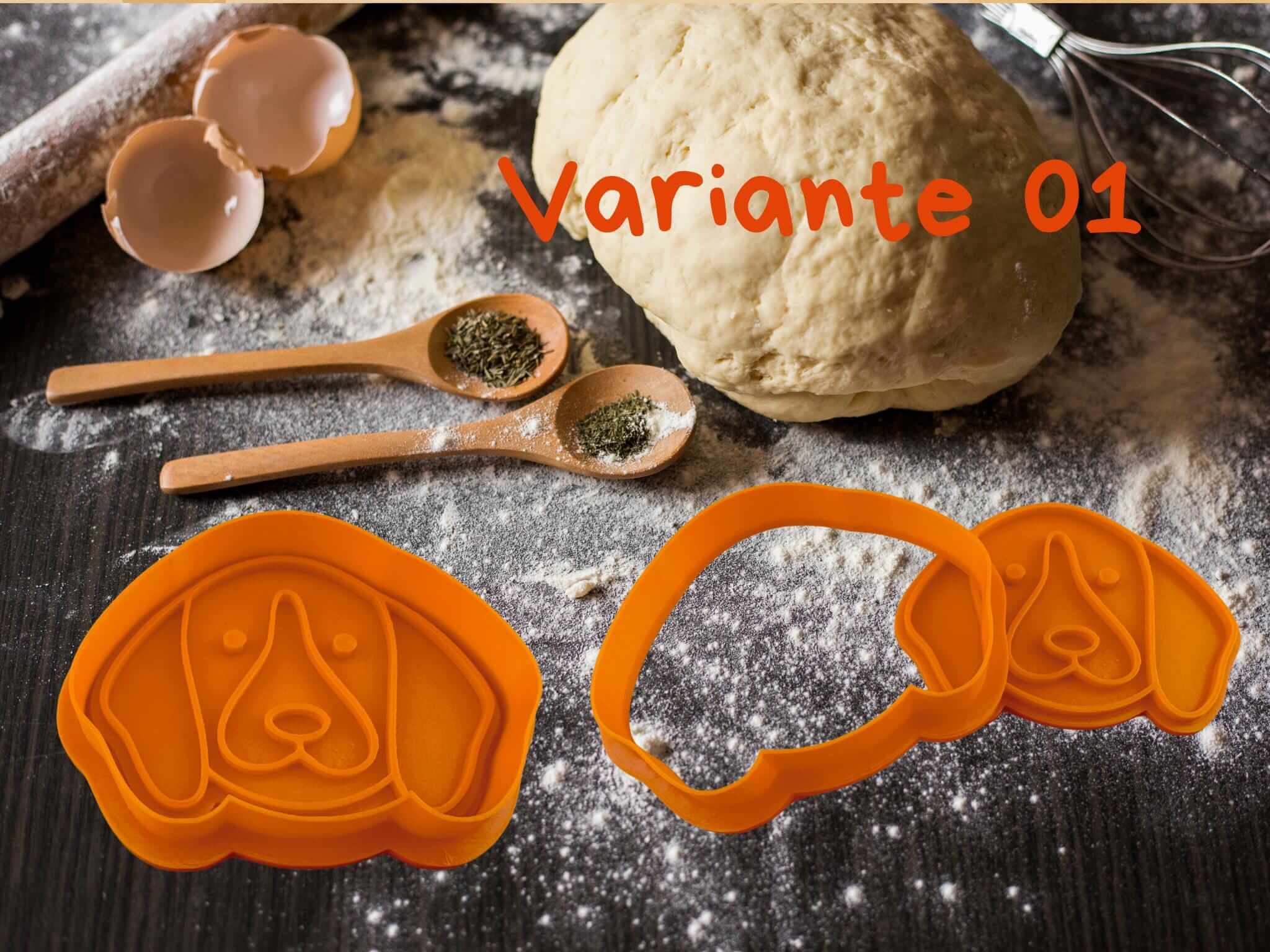 Hunde Keks-Ausstecher in Orange neben Teig und Küchengeräten, ideal für tierisch süße Kekse.