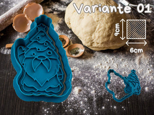 Blue gnome-shaped cookie cutter on a wooden surface with dough and spices, perfect for festive Christmas baking. Size: 9x6cm.