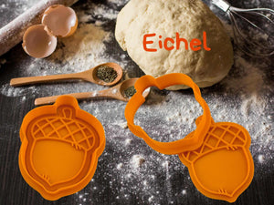 Herbstliche Eichel Keks-Ausstecher aus orangefarbenem Kunststoff, perfekt für herbstliche Backmomente.