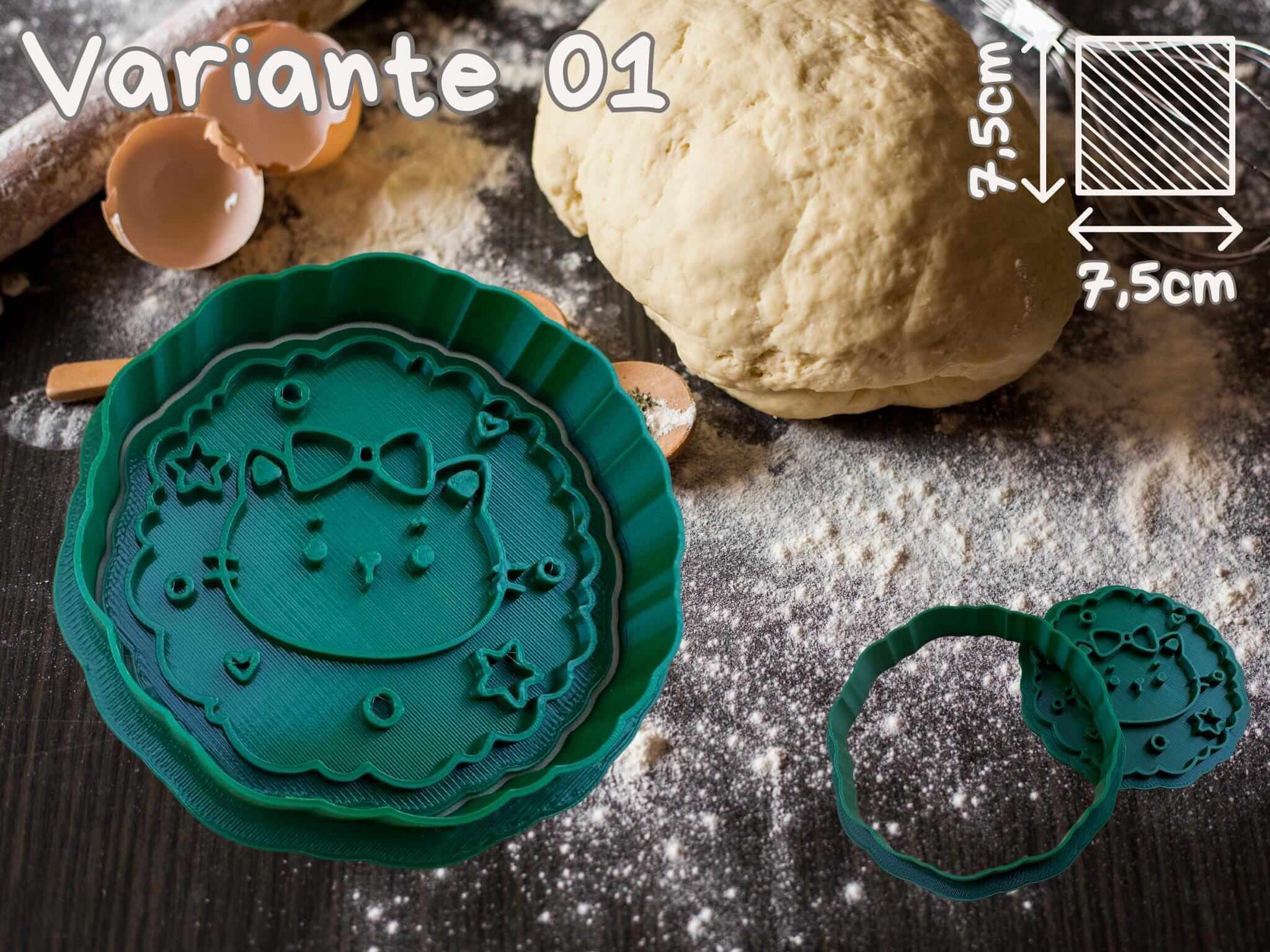 Weihnachtliche Katzen-Keks-Ausstecher in grün auf backender Oberfläche, perfekt für festliche Plätzchen.