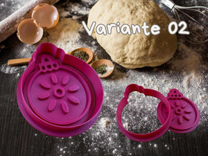 Festive purple Christbaumkugel cookie cutter on a floured baking surface, perfect for elegant Christmas cookies, Variante 02.