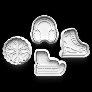 Winter-themed cookie cutters: snowflake, earmuffs, ice skate, and ski. Perfect for festive baking with durable PETG plastic.