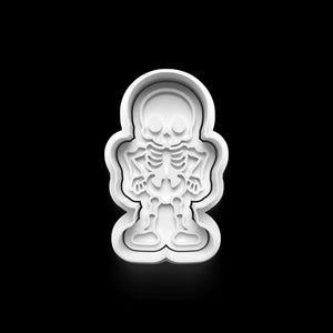 White skeleton cookie cutter for Halloween baking fun, perfect for spooky cookies. One of four designs in the 4-piece set.