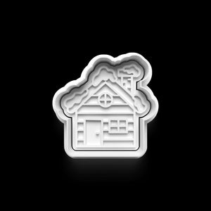 Winterhaus Keks-Ausstecher für kreative Weihnachtskekse, ideal für festliche Bäckereien im Winterwunderland.