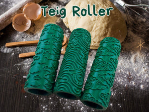 Green rolling pins with cloud patterns for creative baking on a flour-dusted surface, surrounded by baking tools and ingredients.
