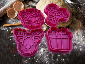 Keksausstecher Set für Weihnachten: Rentier, Geschenk, Zuckerstange und Kranz in pinken Silikonformen.