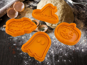 Halloween cookie cutters set in orange: pumpkin, ghost, bat, witch hat for spooky baking fun!