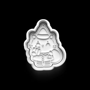 Katzenkeks-Ausstecher im Weihnachtsdesign mit Katze in Geschenke-Attrappe, ideal für festliche Plätzchen.
