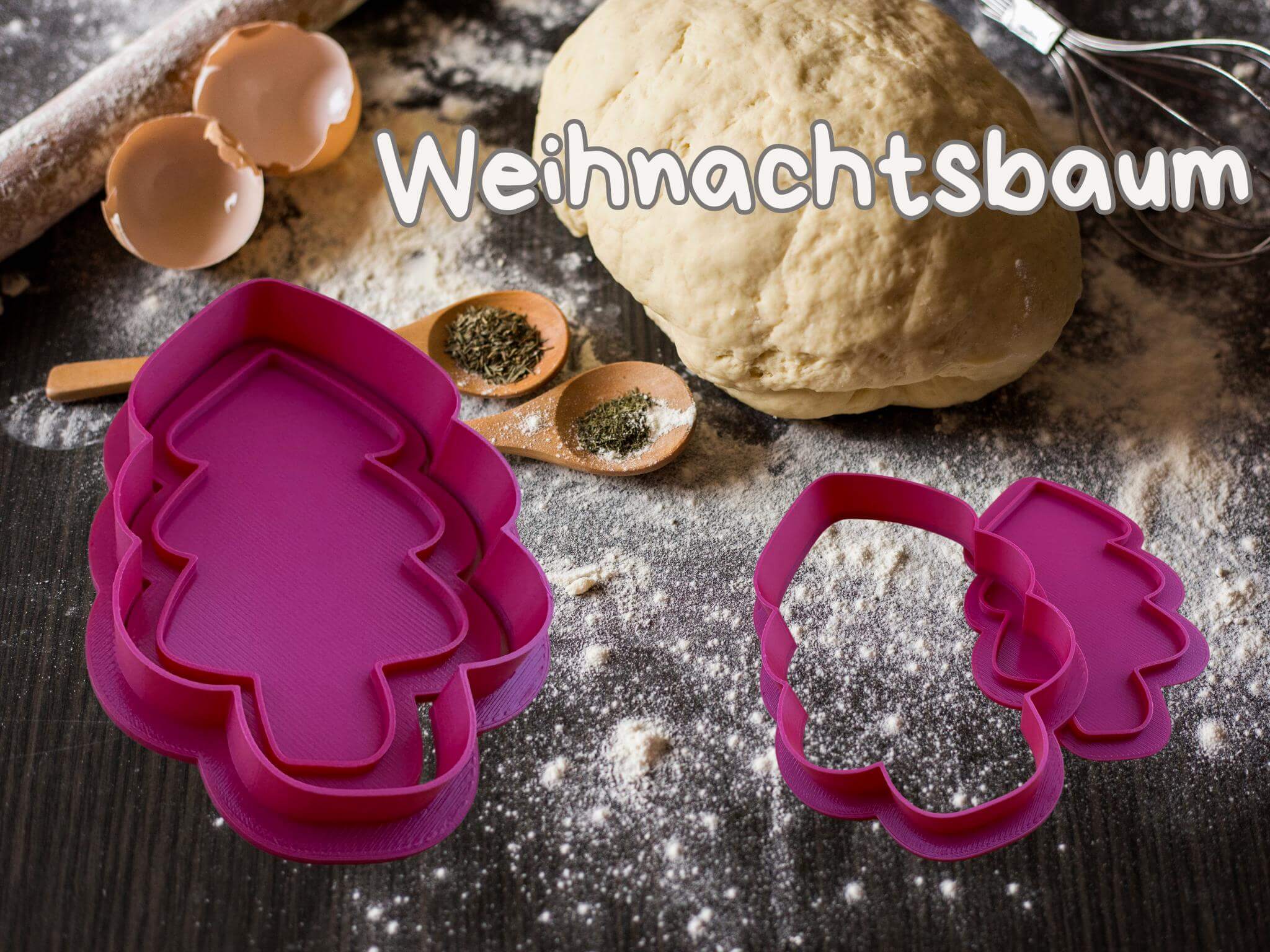 Set of pink Christmas tree cookie cutters on a floured table with dough and baking tools.