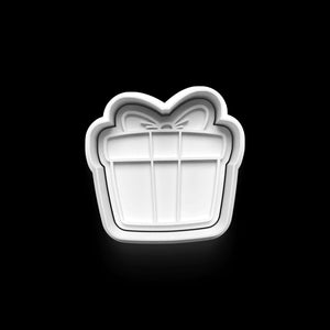 Keksausstecher in Form eines Geschenks für festliche Weihnachtsplätzchen.