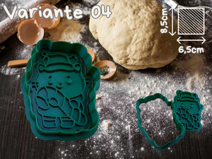 Katzen-Keks-Ausstecher in grün, ideal für festliche Weihnachtsplätzchen, zeigt süßes Katzen-Design auf Backfläche.